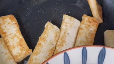 Fried tofu until golden on both sides