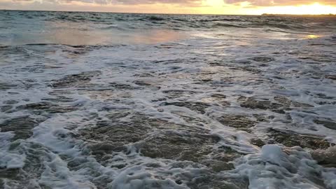 Ocean breaking at dawn