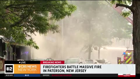 Devastating fire destroys homes _ businesses in Paterson, N.J CBS News