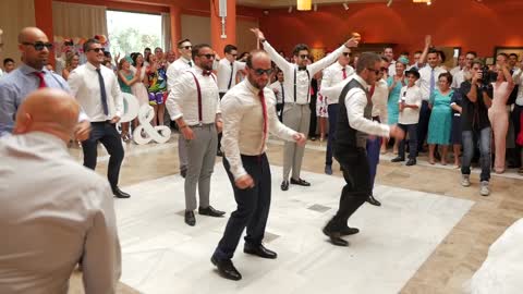 Husband And Groomsmen Deliver Surprise Performance For Bride