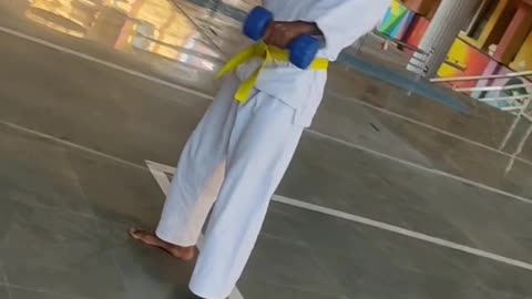 Dumbelling desy style in with karate uniform