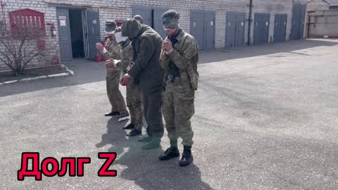 Zajatí ukrajinští vojáci v Rubižném