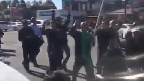 Demonstrations of two groups of Iranian with different views in Toronto