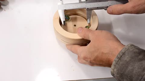 Wooden ball bearing on a lathe