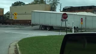 Semi-Truck Stuck on Tracks