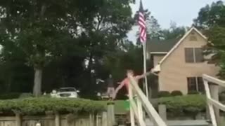 Green shorts belly flop into shallow mud from dock