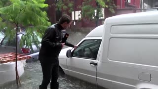 Torrential rain floods streets in Argentina's capital