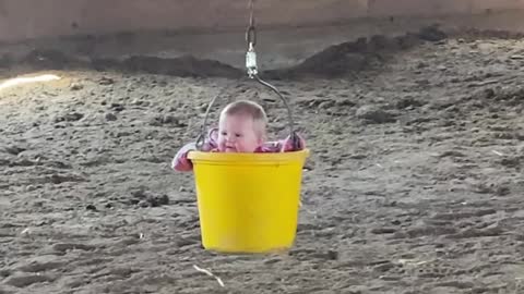 Happy Baby in a Bucket