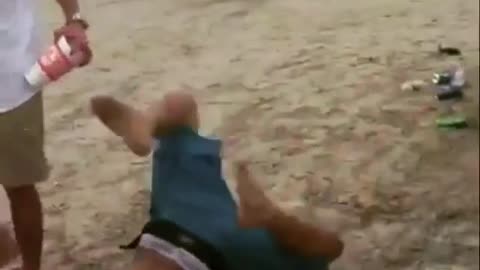 Guy blue shorts trampoline front flip