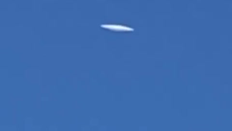 Disc Shaped UFO Appears At Daytime!