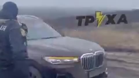 UKRAINIAN POLICE ESCORT A GROUP OF LUXURY CARS TOWARDS THE BORDER OF A EUROPEAN COUNTRY