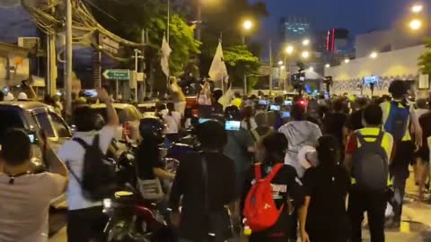 Protesters attack police van amid anger at death of boy, 15, at rally in Bangkok, Thailand
