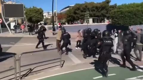 Cadiz, Spain. Riot Squad Hit Elderly Unarmed Man With A Baton