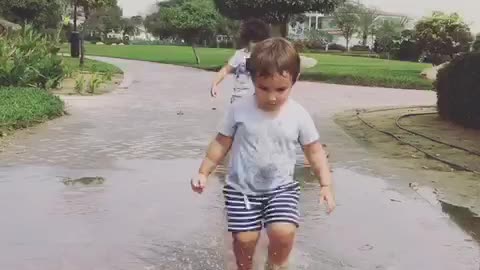 Jumping up and down in muddy puddles