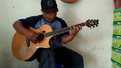 Fingerstyle guitar alif ba ta