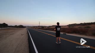 Adventurous Guy Somersaults Over A Moving Car