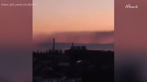 Kyiv’s sky full of smoke at night