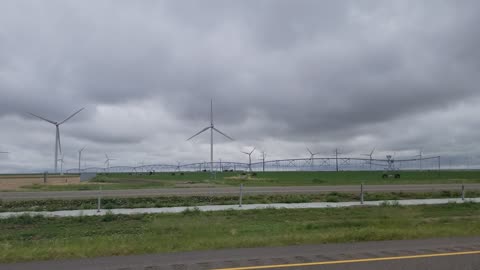 Windmills driving through the top of TX