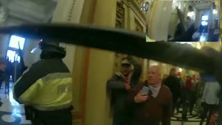 New footage shows police officer beating a Jan 6 protestor with his baton inside the Capitol.
