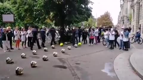 Strasbourg, France: Firefighters Lay Down Helmets, medical Workers toss coats to protest vax mandate