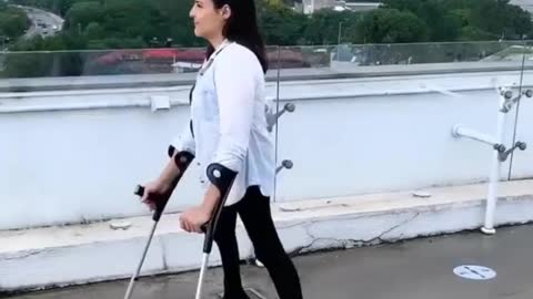 The beautiful Jessica, polio and walking with crutches