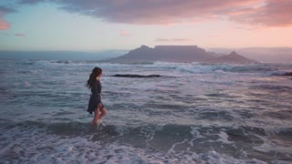 Girl in the arms of the ocean