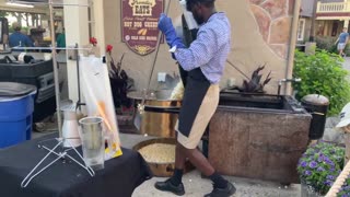 Jamaican Cedar Point Employee Making Salted Kettle Corn on Father's Day Sunday, 06/18/2023, at 19:43