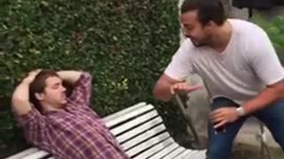 Guy slaps friend