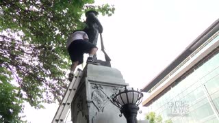 Left-wing activists tear down statue in Durham, N.C.