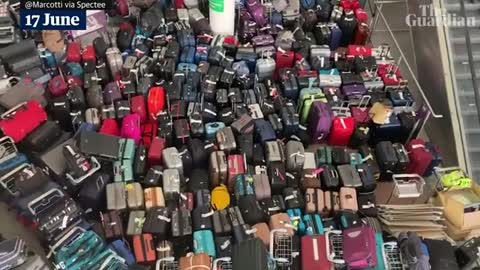 Footage shows luggage chaos at Heathrow airport