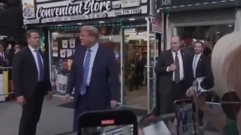 'USA' and 'Four more years!' being chanted as Trump visits a bodega in West Harlem, New York City