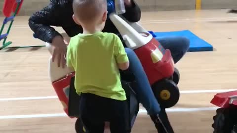 Lady Gets Stuck in Toy Car