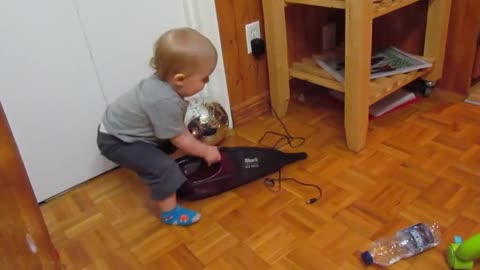 Child Plays With Dustbuster, Freaks Out When It Turns On