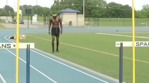 A MAN JUMPS OVER THE SAME HIGHT AS HIMSELF