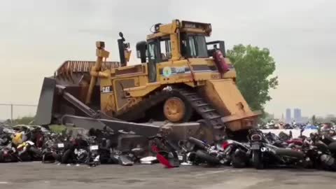 JCB crushing dirt bikes