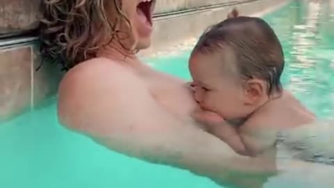 Baby tries to nurse dad