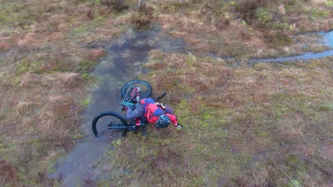 Slick Trail Leaves Cyclist Soaked