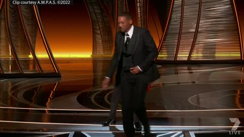 Watch the uncensored moment Will Smith smacks Chris Rock on stage at the Oscars, drops F-bomb