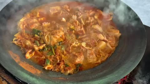 Boiled cauldron chicken stir-fry soup