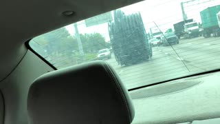 Giant Spool Falls off Truck, Rolls down Highway