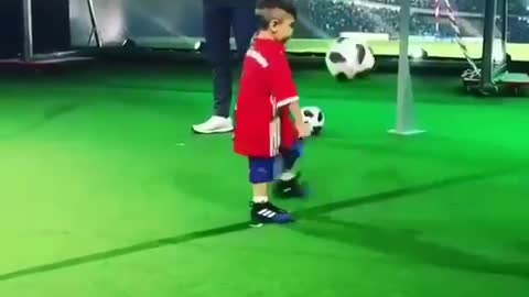 A kid playing Football like professional player!! WOW!!!!