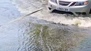 Tractor towing in water