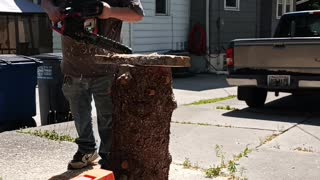 Me carving a cactus from a piece of pine.