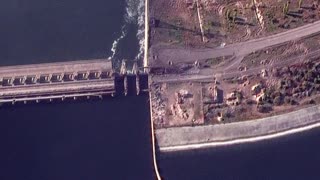 Satellite imagery shows new damage to bridges and dam near Kherson