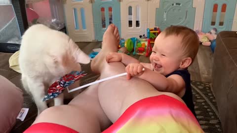 The babby play with moms