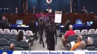 Dominatrix Group shows up to address City Hall.