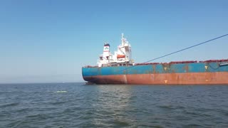 Fishing Next to Tanker in Chesapeake Bay