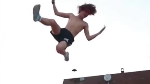 Boy showing his amazing trampoline skills