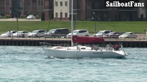 Advantage Sailboat Cruising Down St Clair River In Great Lakes