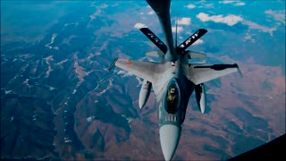 F16 Falcon fighter jet refuels mid-flight